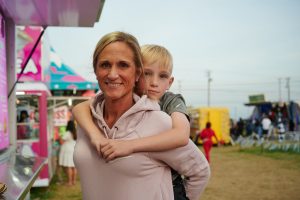 mother son at queen charlotte fair